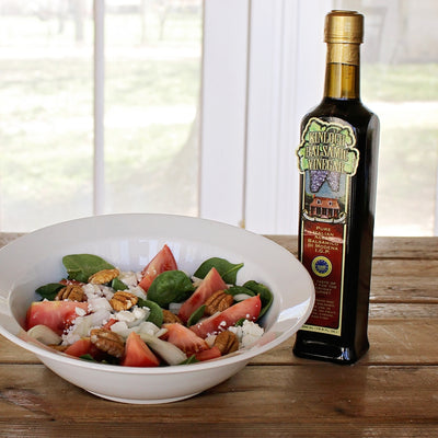 Kinloch Balsamic Vinegar on table with side salad
